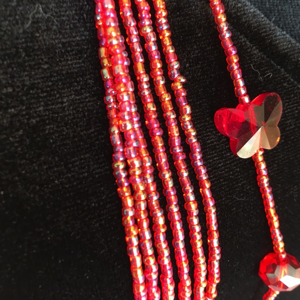 38” Red Crystals. Pinkish Iridescent